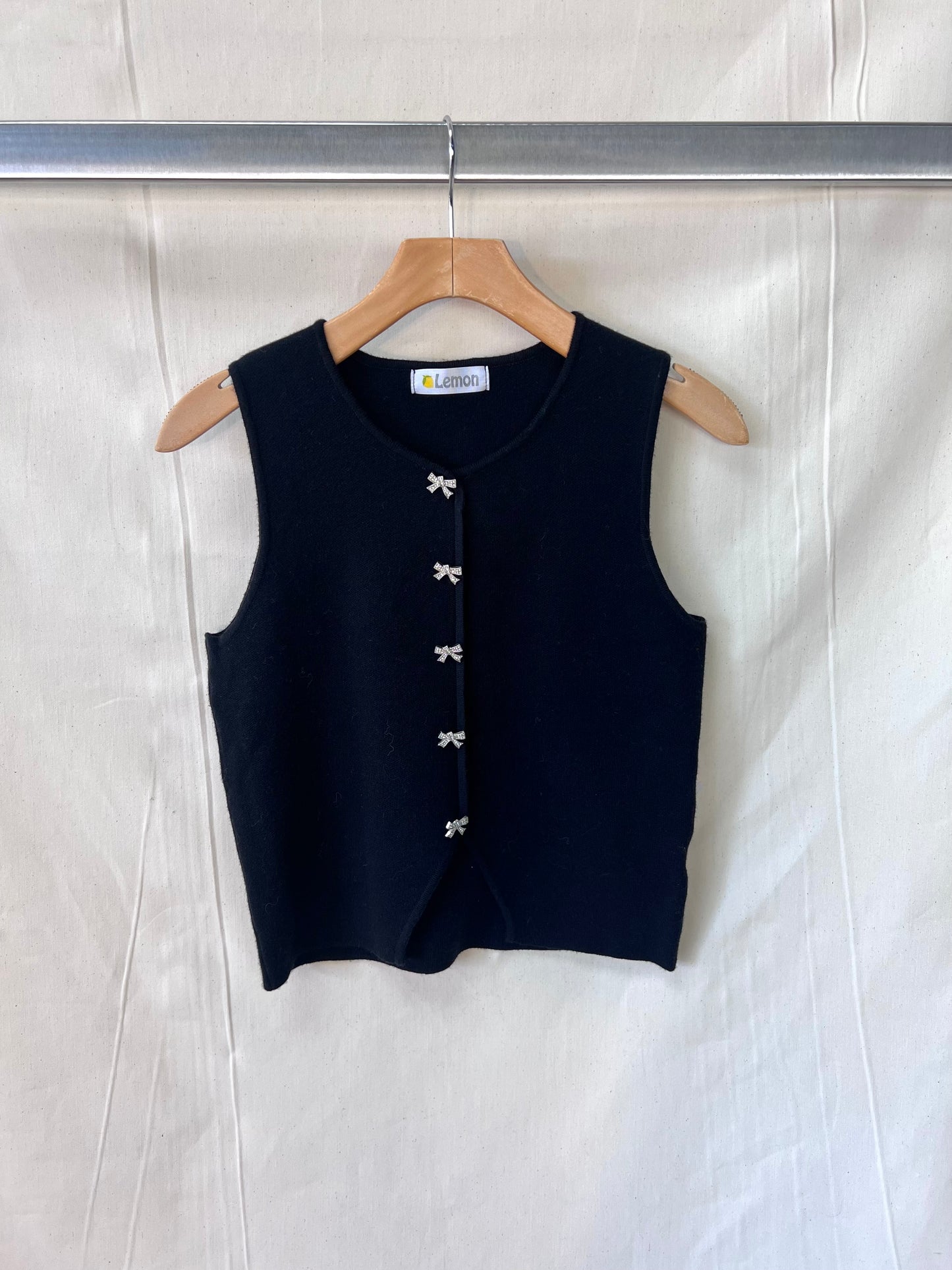 Metal bow button up vest