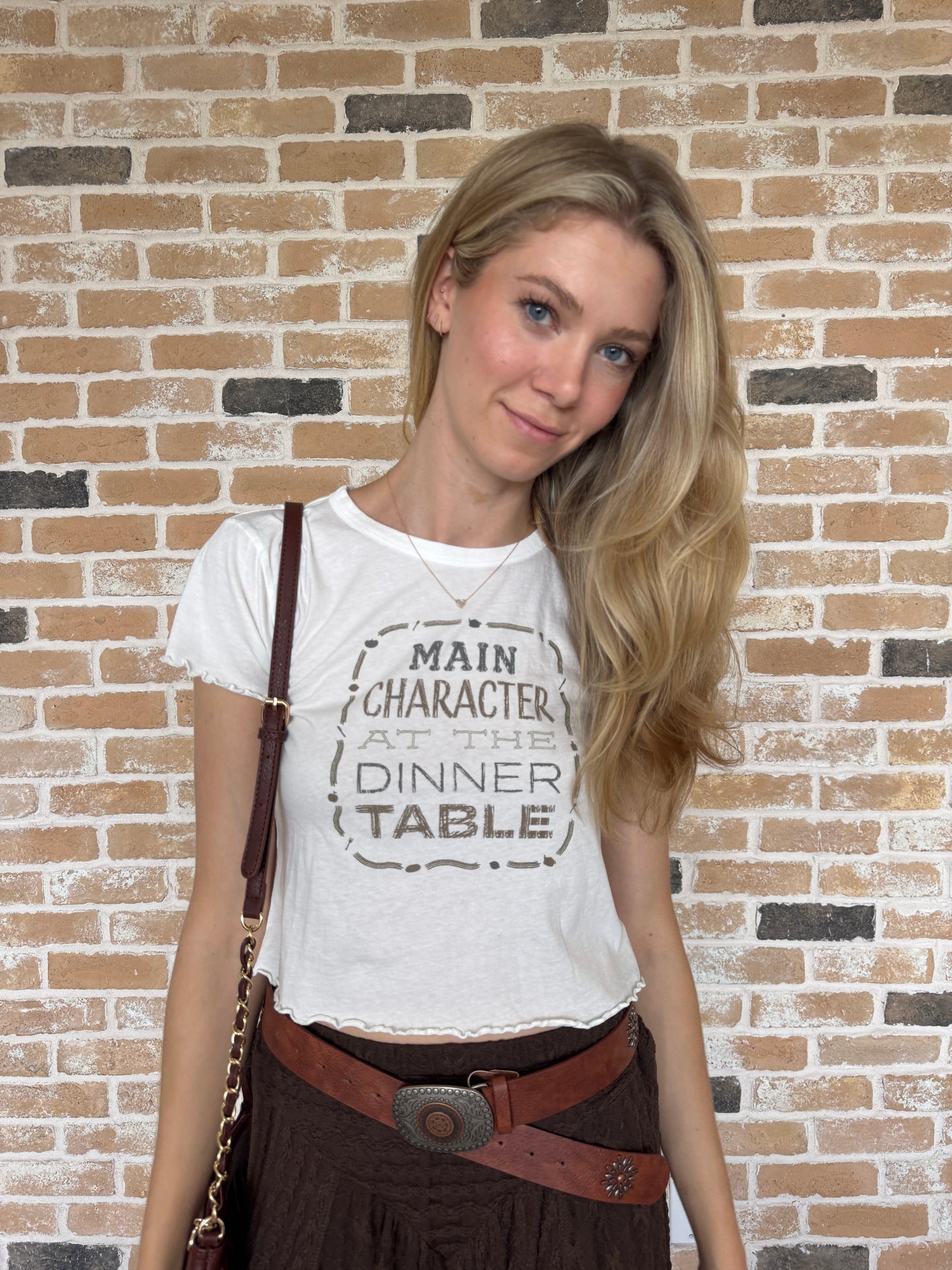 Main Character at the table tee