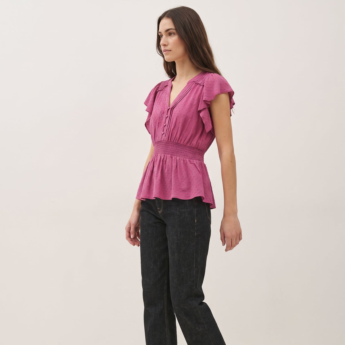 The Camille Smocked-Waist Flutter-Sleeve Peplum Blouse in Magenta