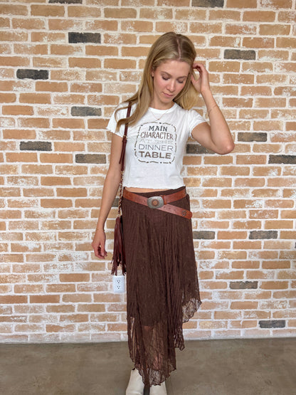 Main Character at the table tee