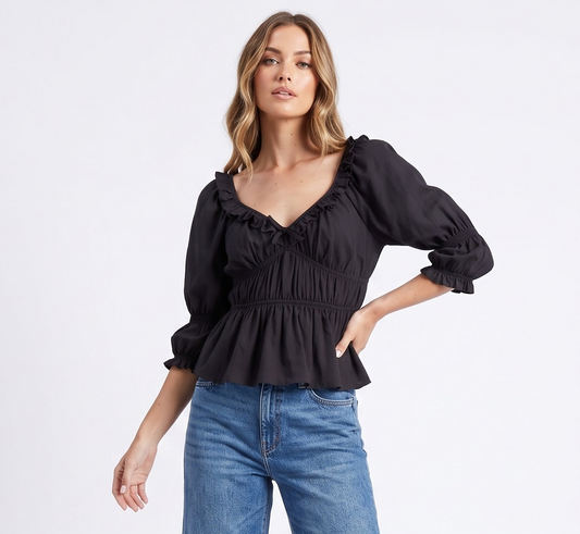 The Marlowe Ruffle Sweetheart Peplum Blouse in Black