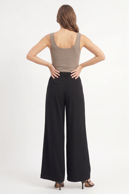 The Monaco Pleated Drawstring Wide-Leg Palazzo Trousers in Black