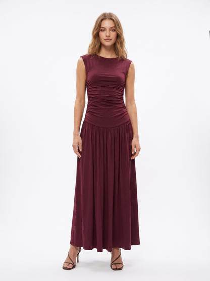 The Valentina Ruched Drop-Waist Sleeveless Maxi Dress in Burgundy