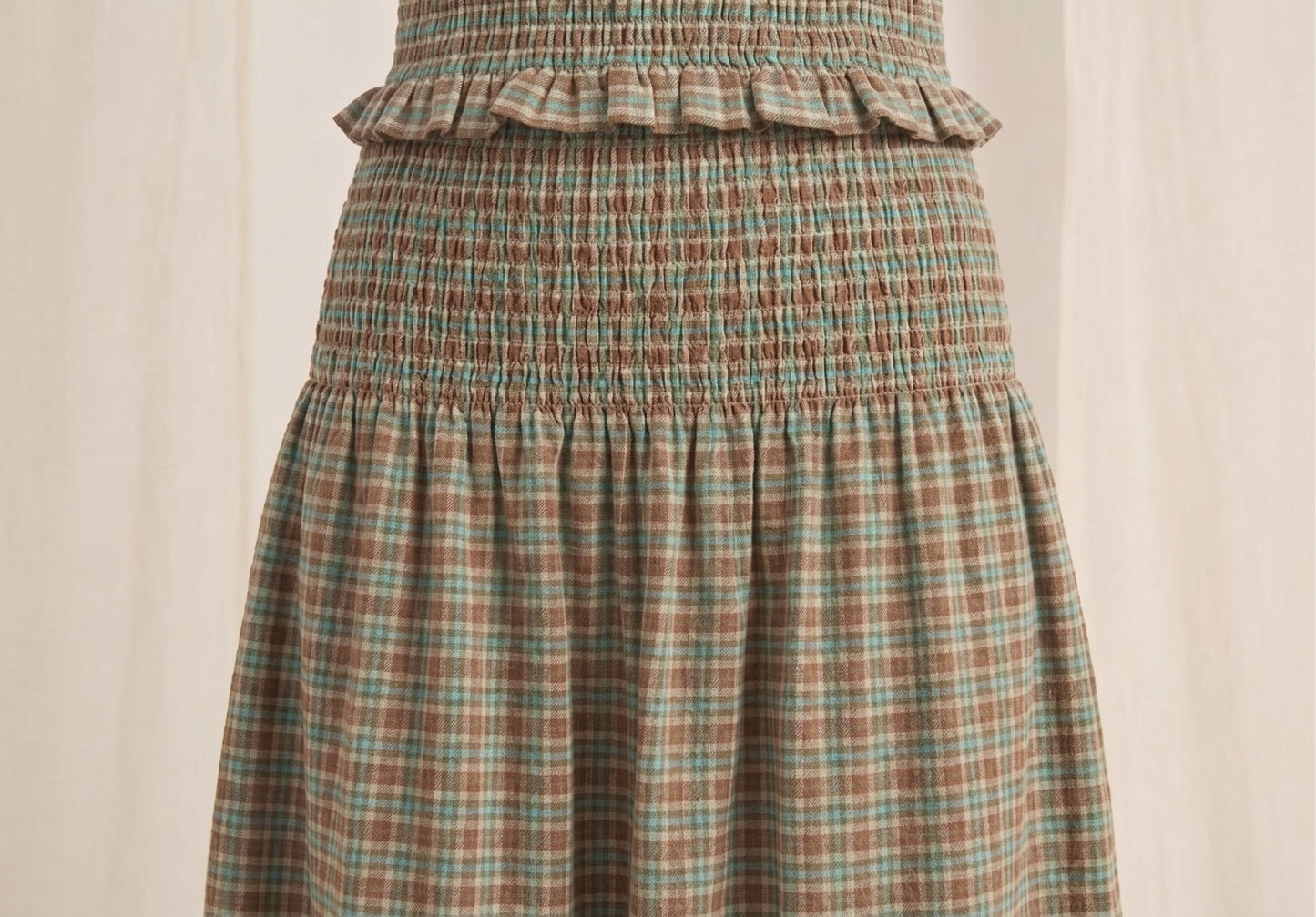 The Hazel Smocked-Waist A-Line Midi Skirt in Sage Plaid