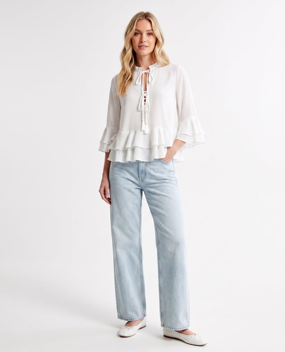 The Vienna Lace-Up Ruffle Tiered Peplum Top in Taupe