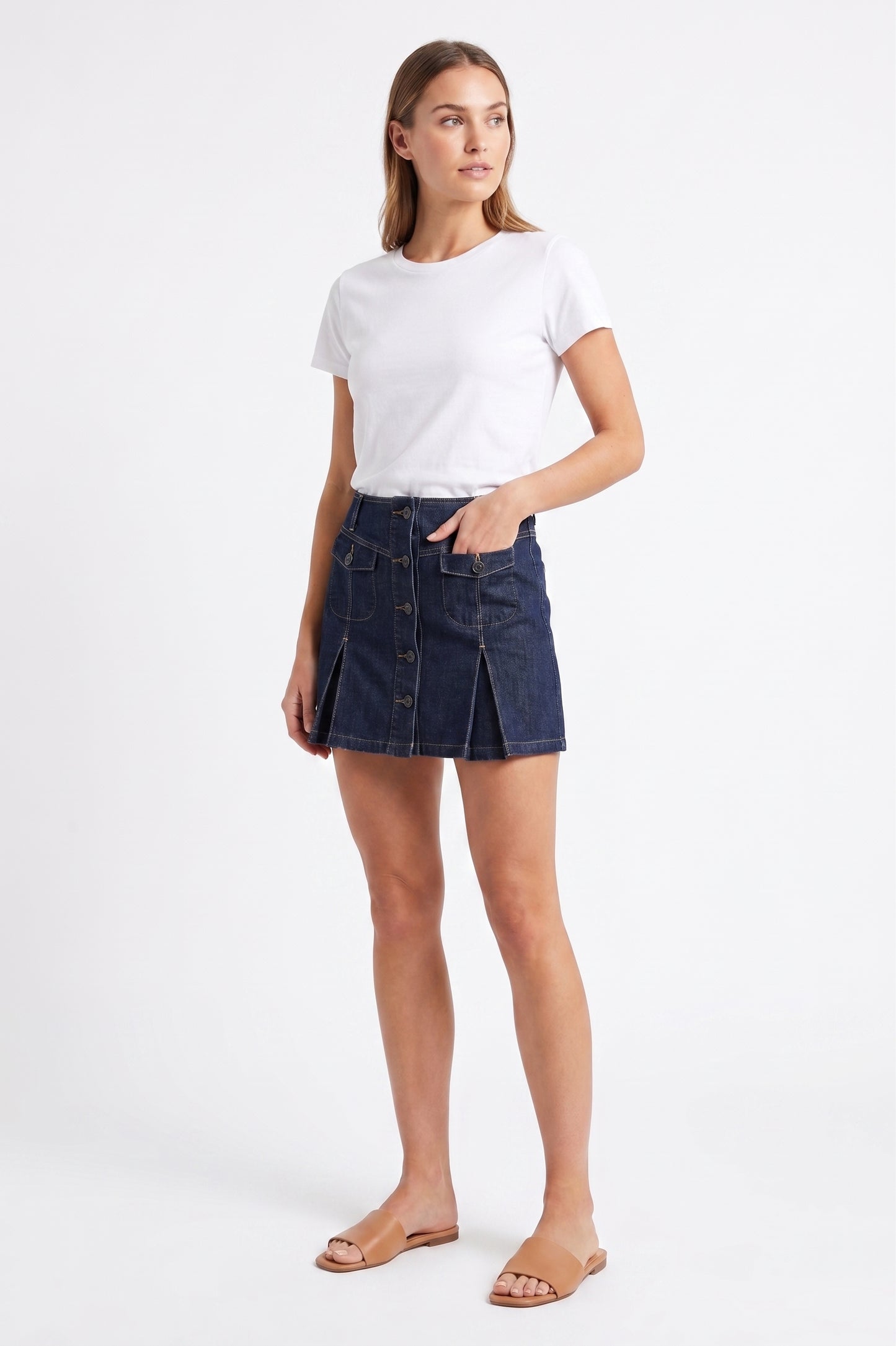 The Cambridge Button-Front Pleated Denim Mini Skirt in Dark Indigo