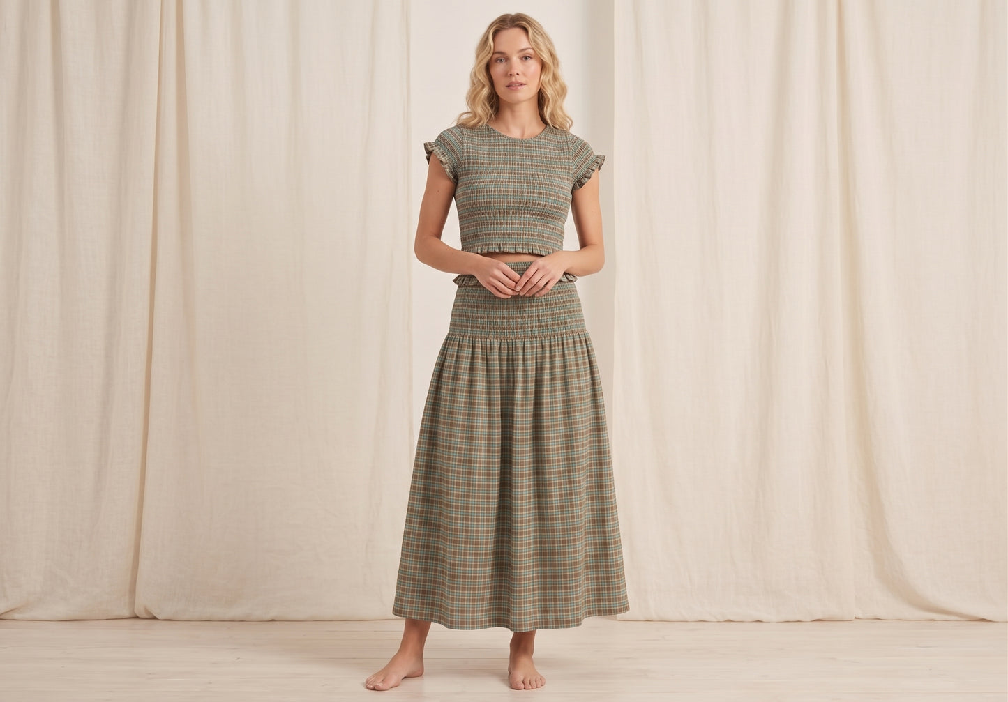 The Hazel Smocked-Waist A-Line Midi Skirt in Sage Plaid