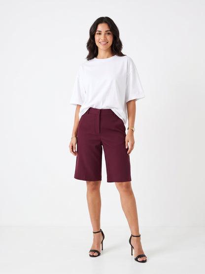 The Kensington High-Rise Tailored Bermuda Shorts in Burgundy