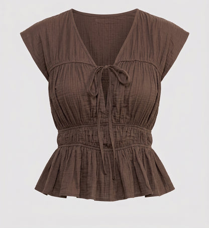 The Selah Keyhole Tie Smocked Peplum Blouse in Espresso