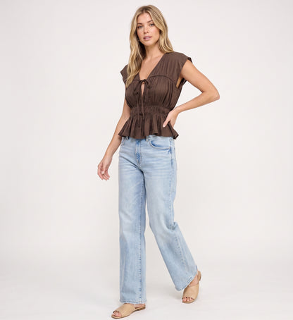The Selah Keyhole Tie Smocked Peplum Blouse in Espresso